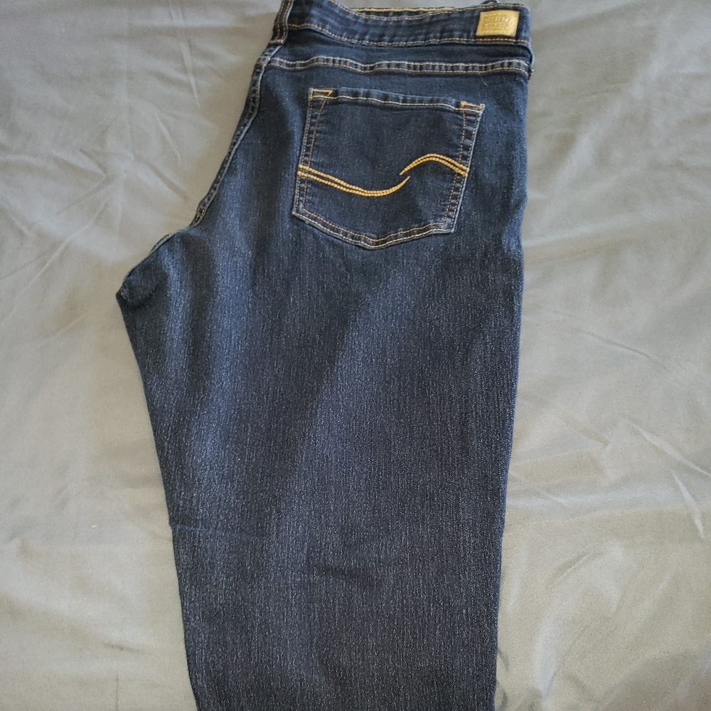 Dark blue Levi Strauss jeans.
